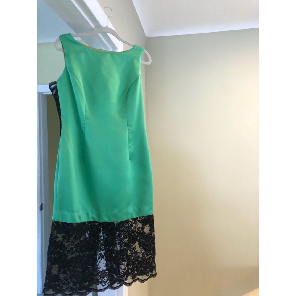 Costume made classy green and black laced dress